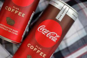 KYIV, UKRAINE - OCTOBER 31, 2023 Can of Coca Cola with coffee flavor. Closed tin can of drink with special design photo