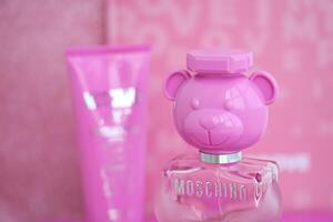 KYIV, UKRAINE - 4 MAY, 2023 Bottle of Toy bubble gum perfume by Moschino, is an Italian luxury fashion house founded in 1983 by Franco Moschino photo