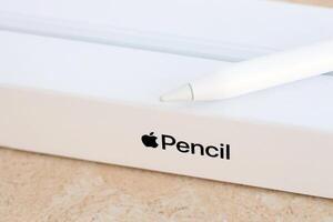 KYIV, UKRAINE - 4 MAY, 2023 New Apple pencil generation 2. Features a flat edge that attaches magnetically for automatic charging and pairing photo