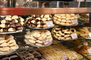 a displat of fresh pastry in a market photo