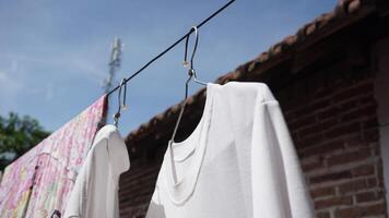 laundry drying on a clothesline photo