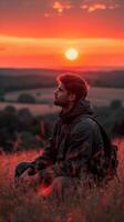 AI generated Man Sitting in Field at Sunset, Enjoying the Last Rays of Light photo