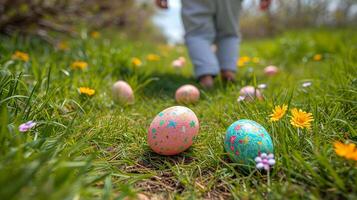 AI generated A small child walking among colorful eggs in the meadows. photo