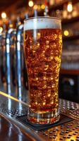 AI generated Glass of Beer on Bar Counter photo