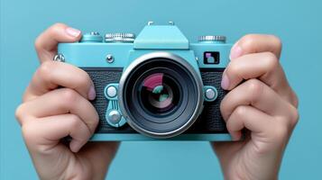 AI generated Hands Holding Vintage Camera Against Blue Background photo