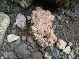 Close up view of the strange patterned background of mountain rocks taken while traveling in Sulawesi, Indonesia photo