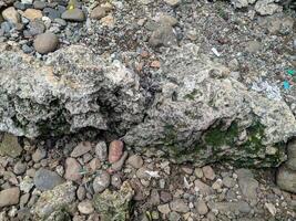 Close up view of the strange patterned background of mountain rocks taken while traveling in Sulawesi, Indonesia photo