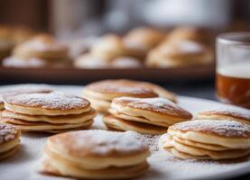 ai generado apilar de poffertjes un tradicional holandés tortita con azúcar polvo foto