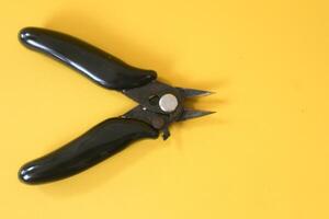 Iron pliers are good for cutting iron wire, Small and strong wire scissors photo