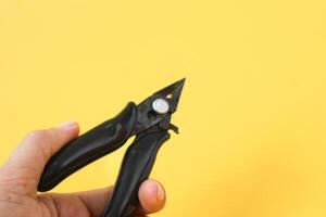 Iron pliers are good for cutting iron wire, Small and strong wire scissors photo