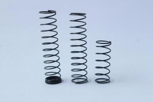 Metal steel spring spare parts for industry. photo