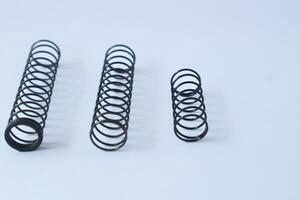 Metal steel spring spare parts for industry. photo