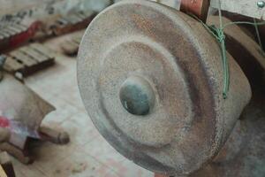 Old and rustic metal gong, traditional balinese percussive music instruments for ensemble music, traditional music in Bali and Java, Indonesia. photo