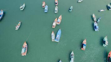 Serene Aerial Shot of Fishing Boats photo