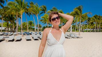 Blissful Beach Day, Woman Embraces Sun photo