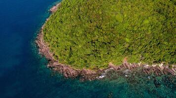 Aerial Coastline Merge into Turquoise Sea photo