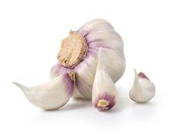 garlic with shell on white background photo