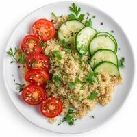 AI generated A plate of quinoa salad with sliced cucumber and cherry tomatoes top view isolated on a transparent background photo