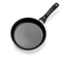 black frying pan isolated on white background photo