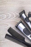 Setting with hair clipper and comb photo