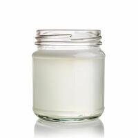 AI generated A crystal clear glass jar of organic coconut oil isolated on a transparent background photo