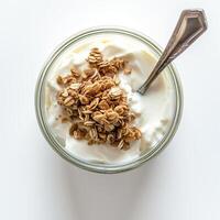 AI generated A jar of homemade coconut yogurt with a spoonful of granola top view isolated on a transparent background photo