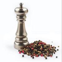 AI generated A designer stainless steel peppermill beside a peppercorn medley isolated on a transparent background photo