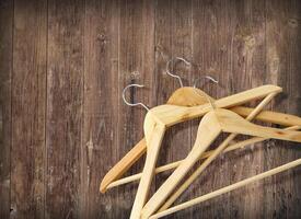 clothing hanger on wooden photo