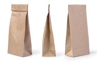 Brown paper bag packaging template isolated on white background photo