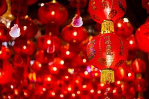 Red lanterns word mean may wealth come generously to you decorating for Chinese new year festival. photo