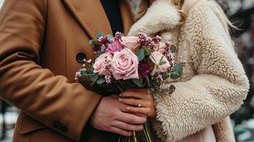 AI generated Hands of a couple with an engagement ring and a bouquet. A man and a woman in a coat. Macro photography. Copy space. photo