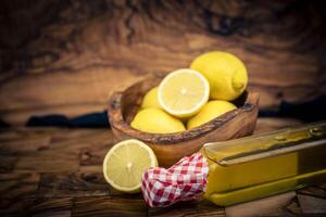 lemon fruits on olive wood photo
