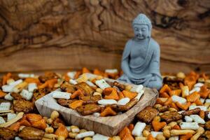 Different types of Japanese rice cakes on olive wood photo