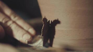 the potter forms the shape of a clay jug with the help of an instrument video