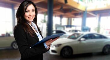 Saleswoman with folder and auto show background photo
