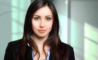 Smiling young female manager portrait photo