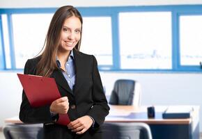 Smiling businesswoman in her office photo