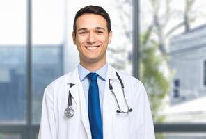 Handsome young doctor portrait photo