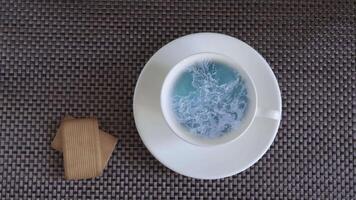Sea waves in a cup. The dream of vacation and travel. Top view. Close-up. video