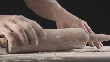 Male hands take piece of dough after rolling out video