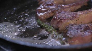 Onions are thrown to the cast iron pan fried in butter video