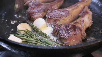 Onions are thrown to the cast iron pan fried in butter video