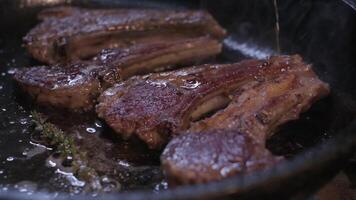 Onions are thrown to the cast iron pan fried in butter video