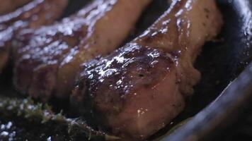 Onions are thrown to the cast iron pan fried in butter video