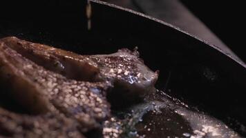 Onions are thrown to the cast iron pan fried in butter video