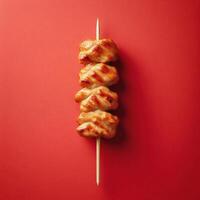 AI generated Top-down view of tasty Japanese chicken skewers on a wooden stick photo