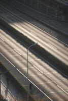 Tunnel entrance road at sunset photo