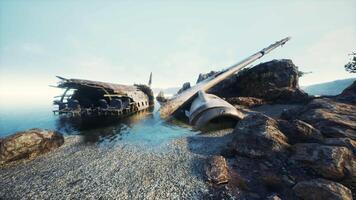 Crashed airplane on rocky island shore video