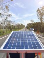 Solar panels capture sunlight to be reused as electricity for use in road safety applications. photo