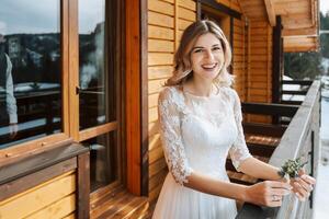 The bride in a white wedding dress is waiting for the groom. The first meeting of the bride and groom. Wedding in nature in winter. photo